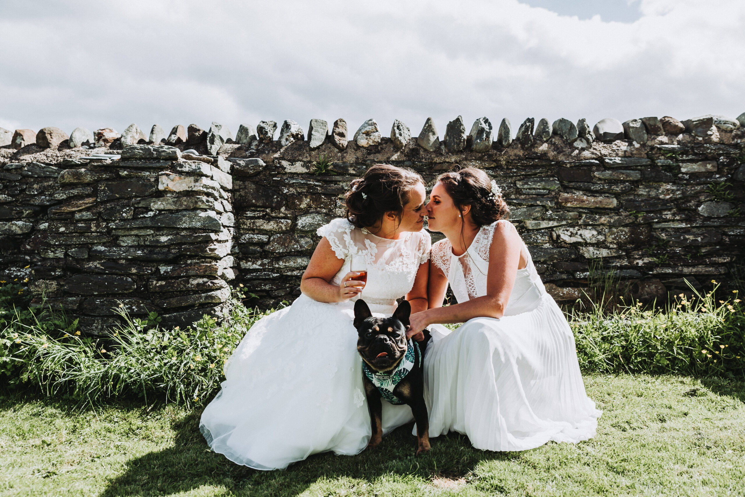 two brides with dog at lgbtq+ scotland wedding