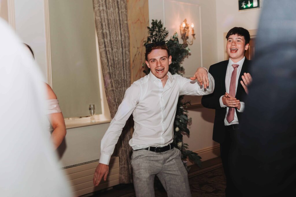 man dancing at a wedding