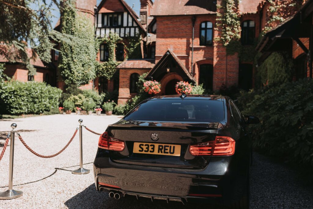 car outside careys manor wedding venue