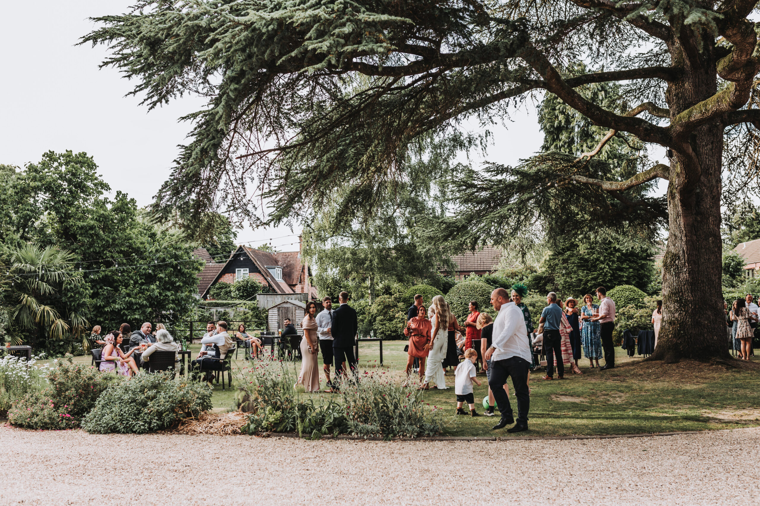 guests mingling at careys manor wedding