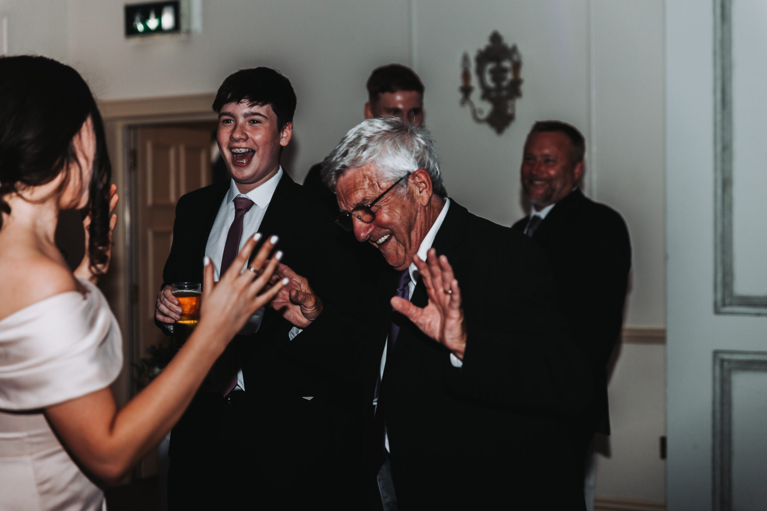 older man dancing at a wedding