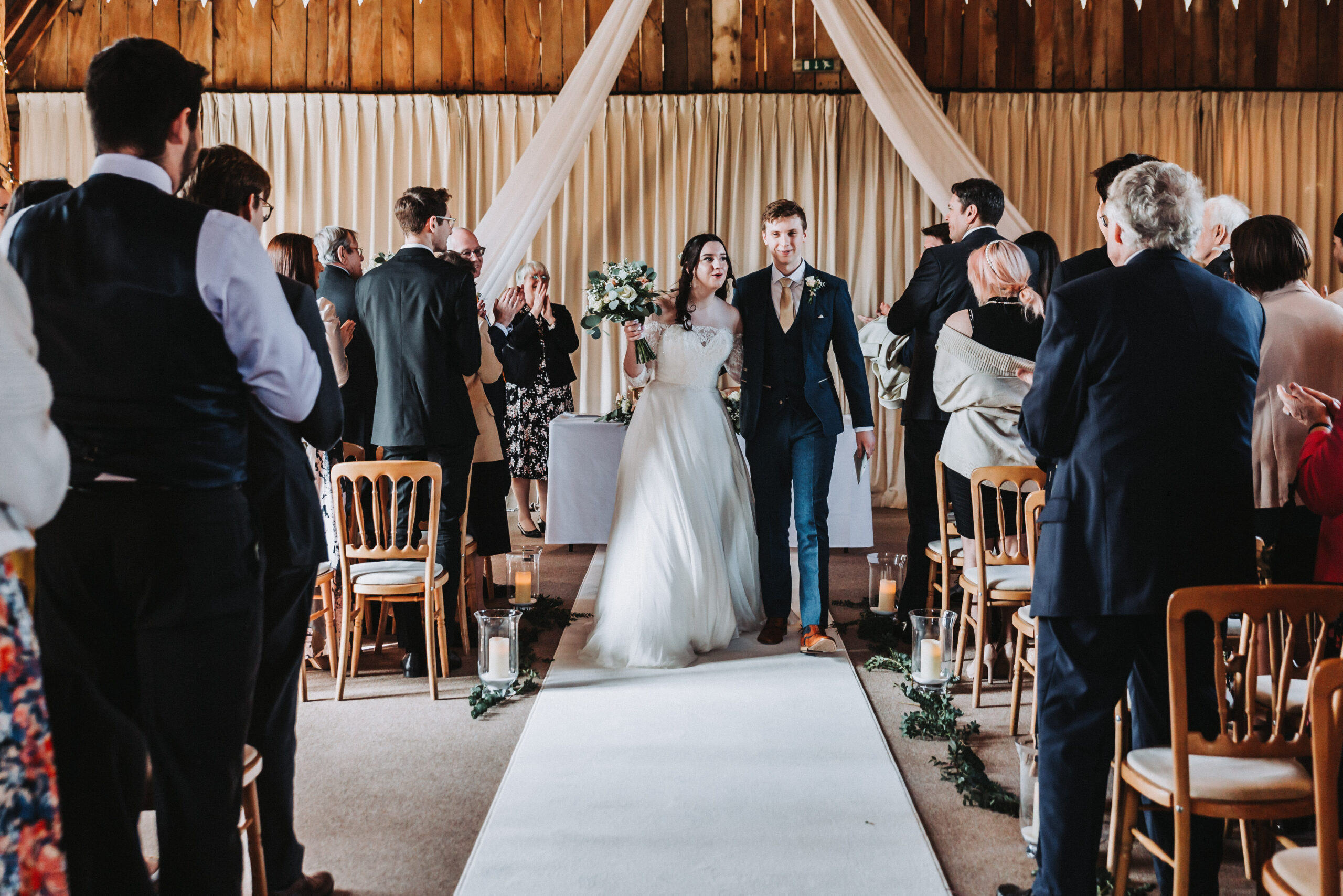 married couple at clock barn wedding ceremony