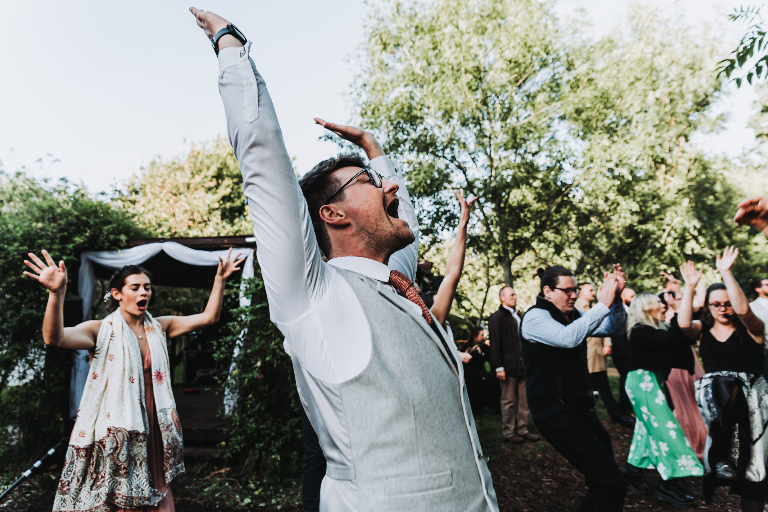 groomsman dancing at chichester woodland wedding