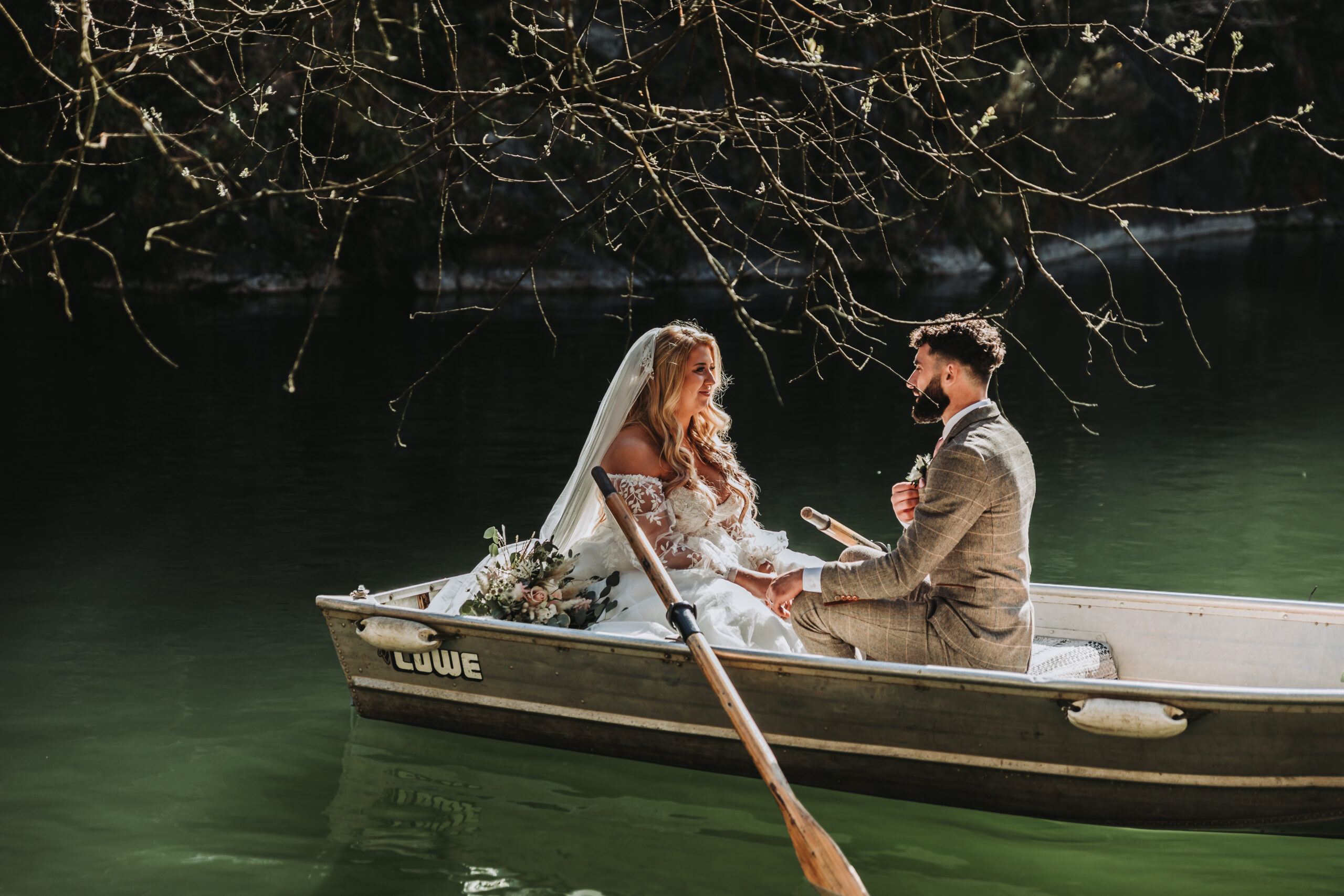 couple paddling at wedding venue in south west england