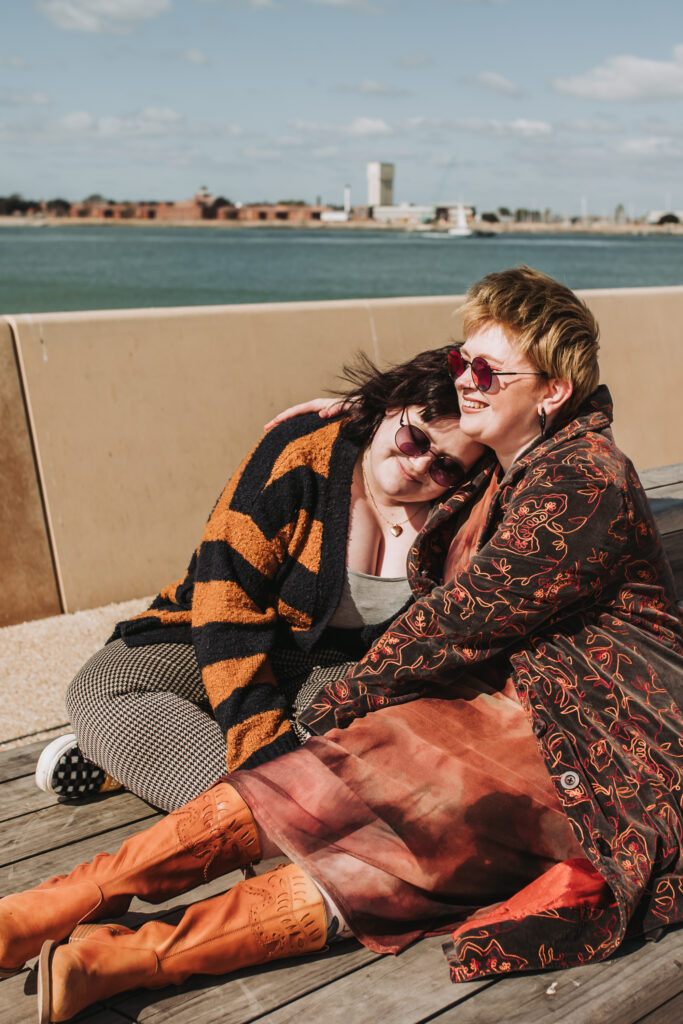 couple cuddling taken by lgbtq+ photographer