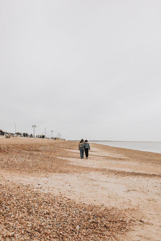 lgbtq+ photographer taking photo of people walking