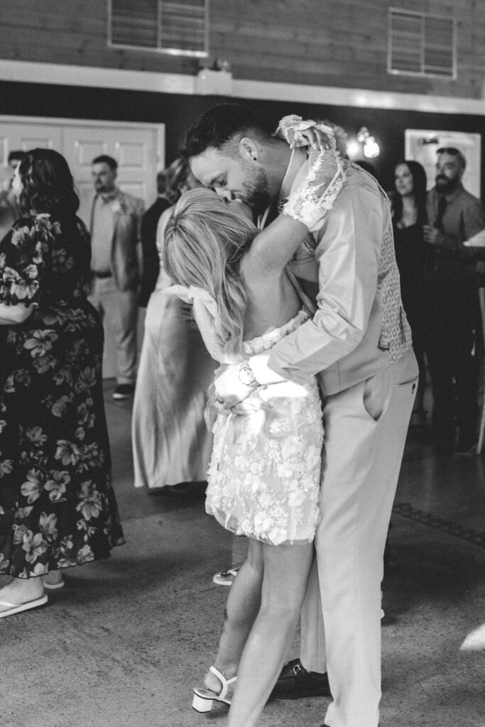 bride and grrom kissing on wedding dancefloor at chycara wedding