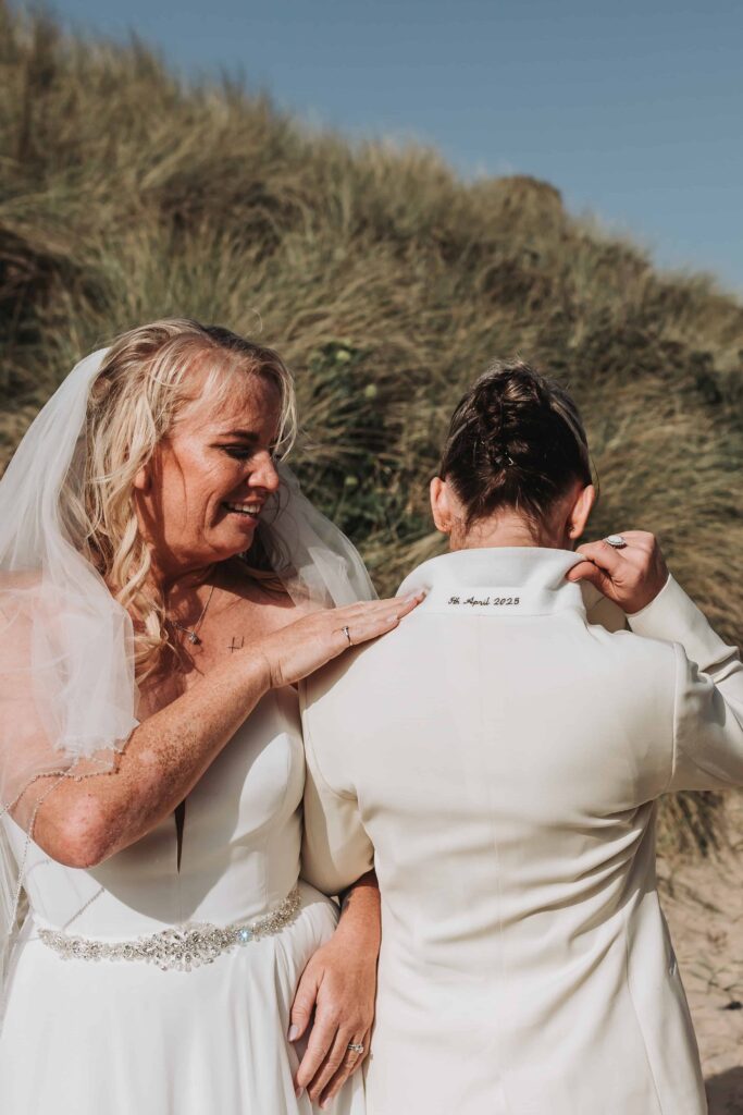 brides showing date on tailored suit