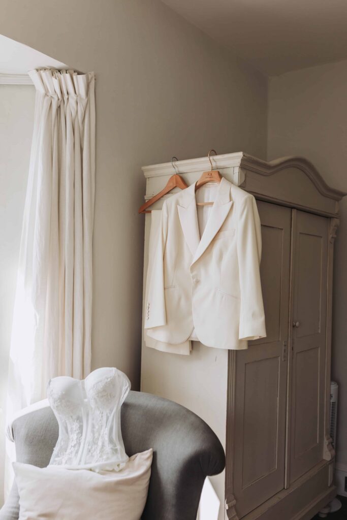 pale yellow tailored female suit with corset