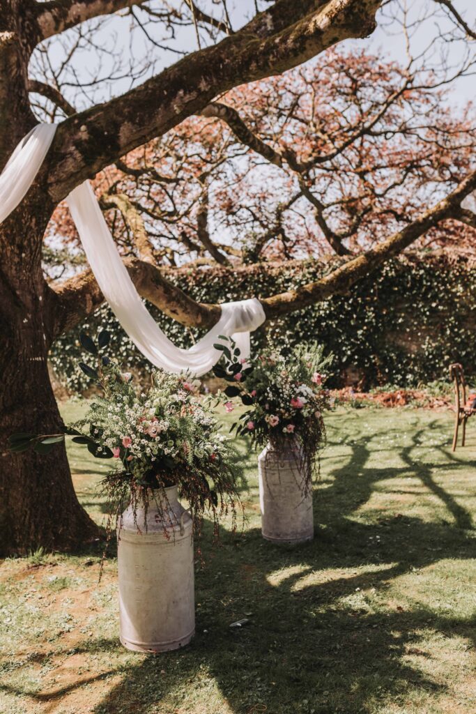 ceremony set up underneath walnut tree photo by lgbtq+ wedding photographer