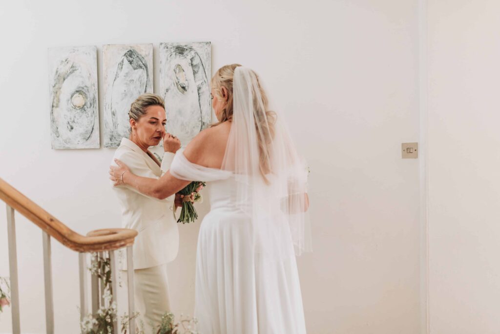 two brides having a first look
