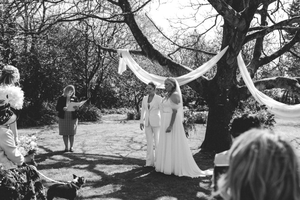 two brides getting married under walnut tree