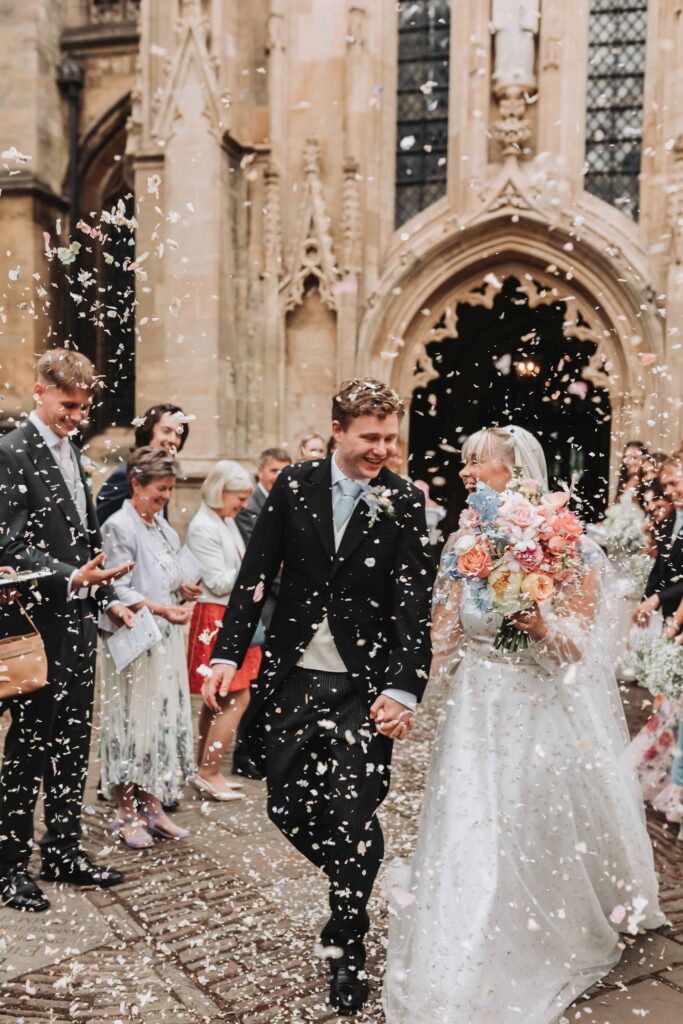 confetti walk through with bride and groom