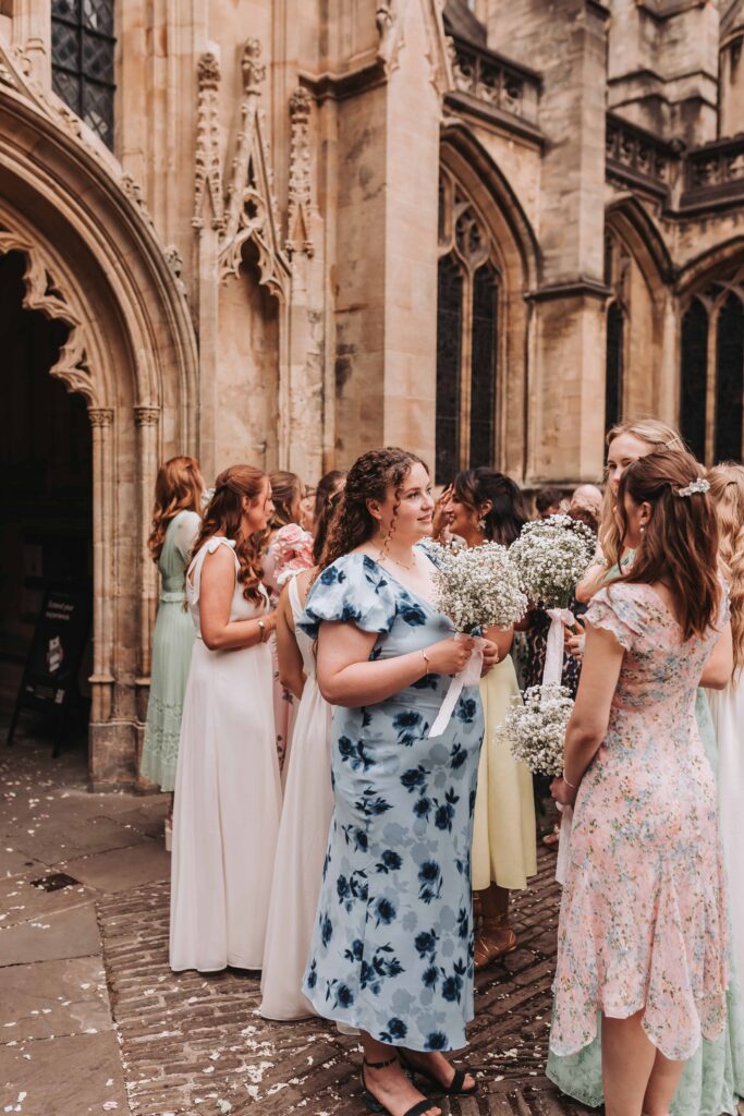 guests talking outside church wedding in bristol