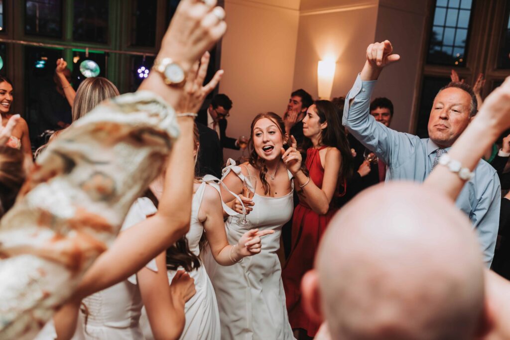 flower girls dancing at bristol wedding