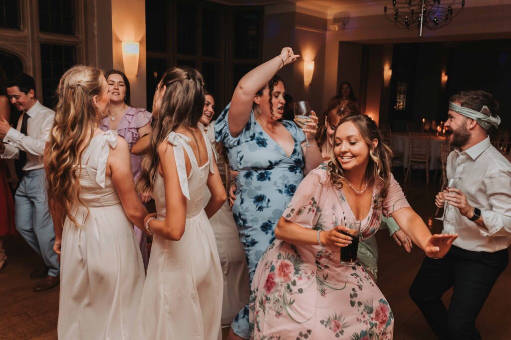 bridesmaids dancing at coombe lodge wedding