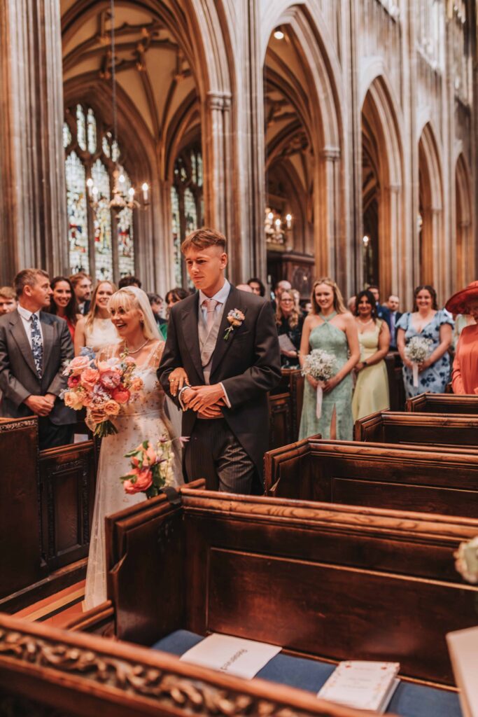 bride and brother walking down the aisle at bristol wedding