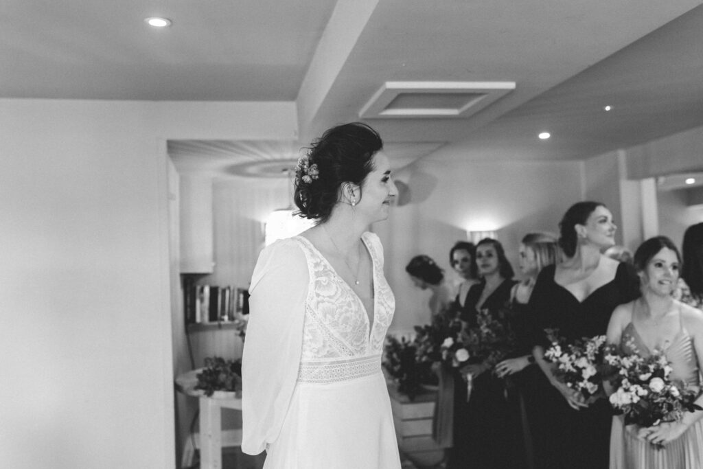 brides reaction to her bride walking down the aisle