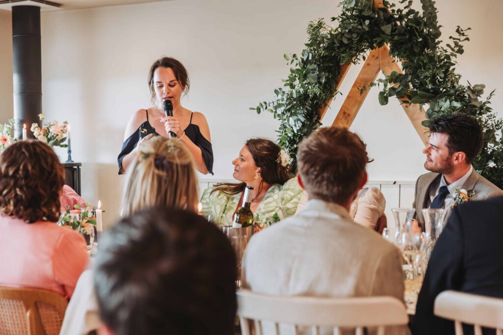 bridesmaid giving a speech at cornish wedding
