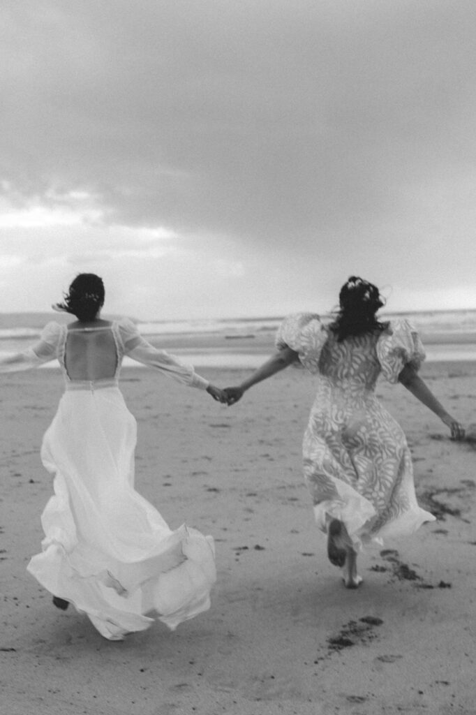 brides running down to the sea
