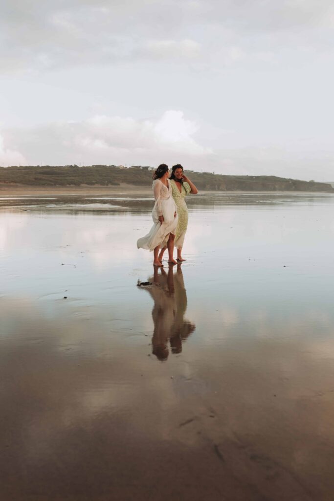 brides standing together by lgbtq wedding photographer