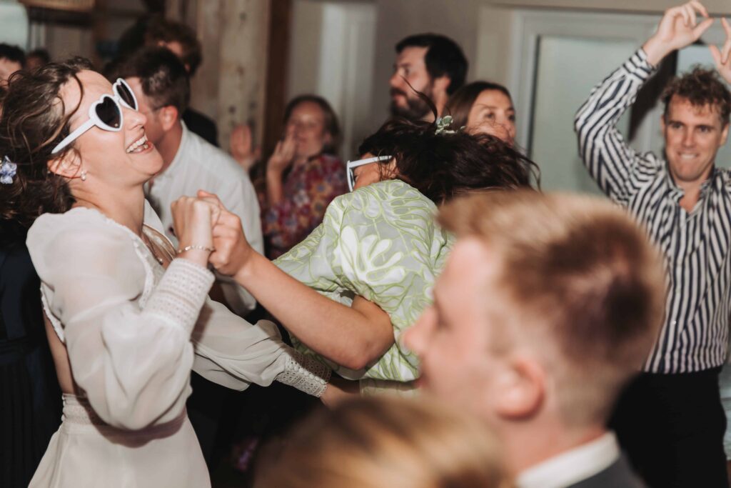two brides dancing by lgbtq wedding photographer