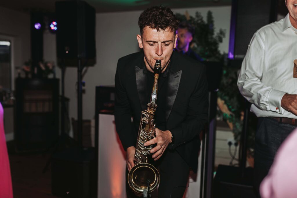 saxophone player at lgbtq wedding