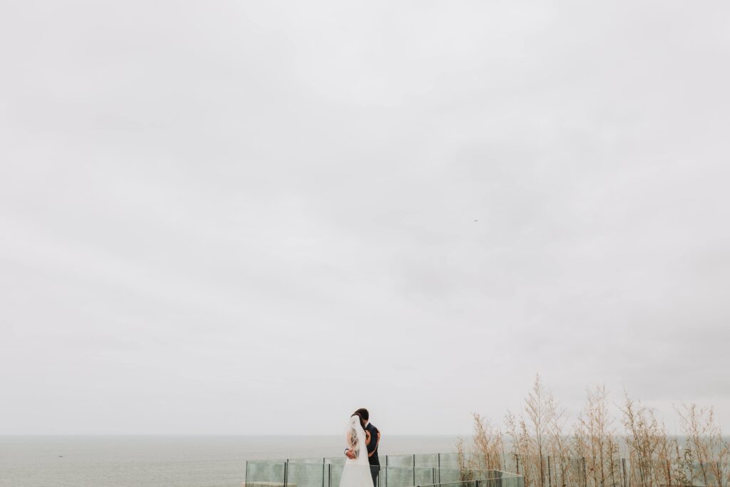 bride and groom holding eachother at pennsylvania castle estate