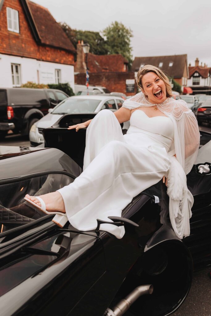 bride getting into batmobile