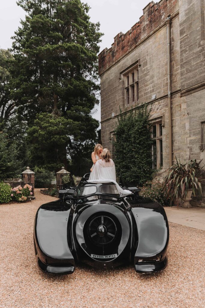 brides stood in batmobile