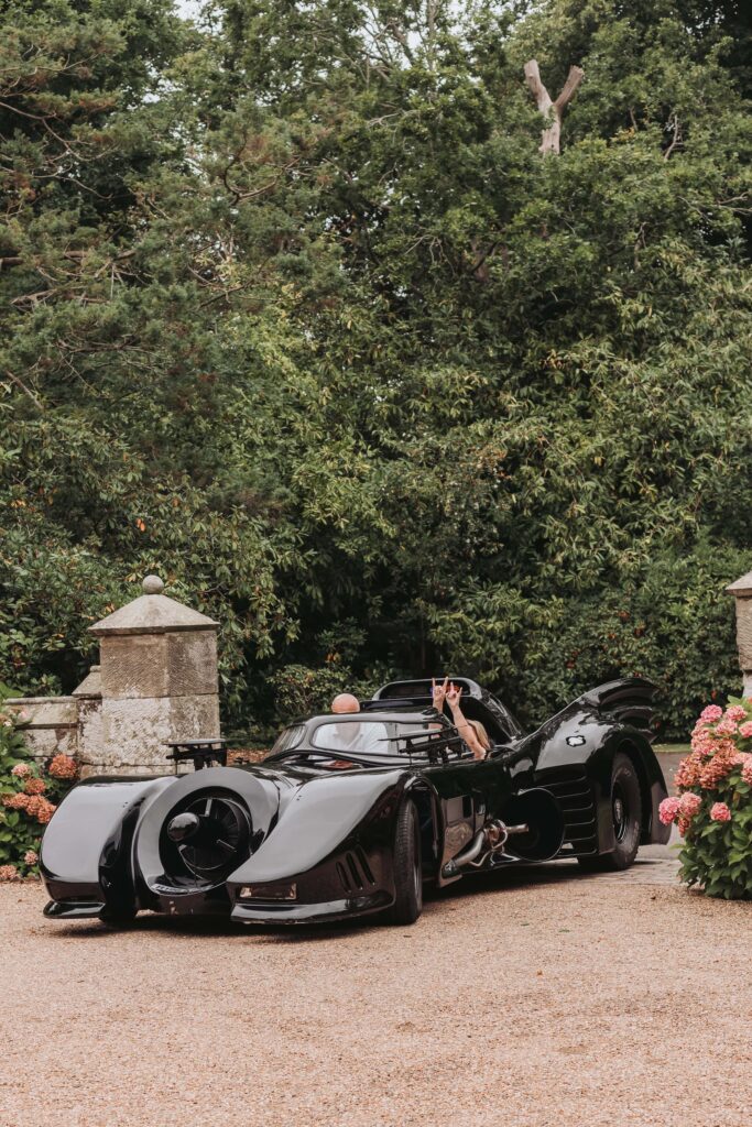 batmobile arriving at wadhurst castle wedding