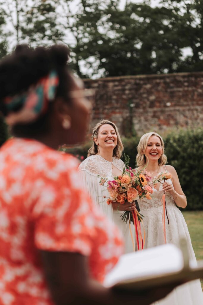 two brides at wadhurst castle wedding ceremony