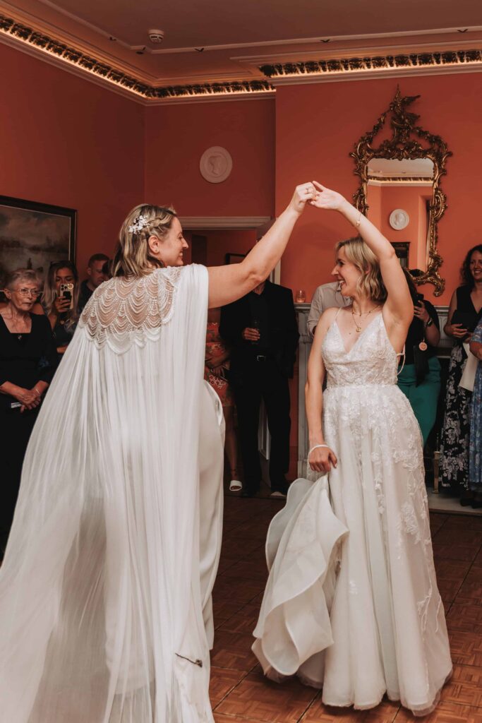 two brides first dance at lgbtq weddings