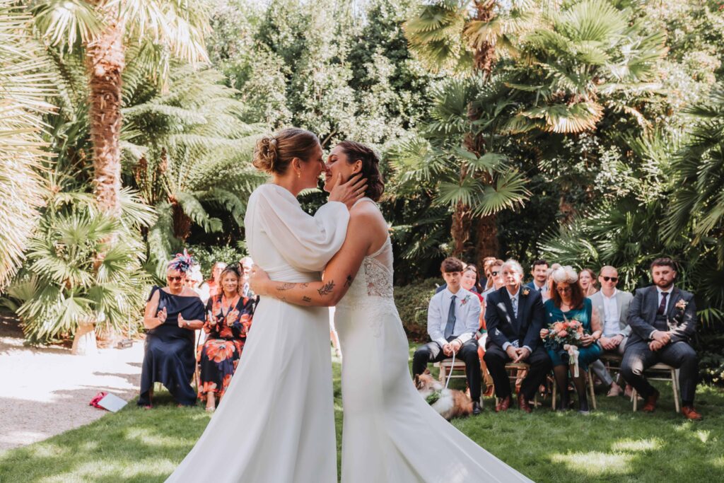first kiss with two brides at cornwall lgbtq+ wedding