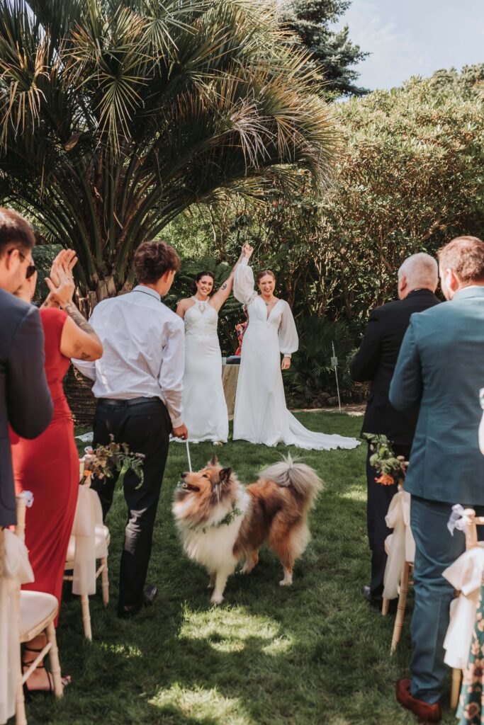 two brides celebrating saying i do at lamorran gardens