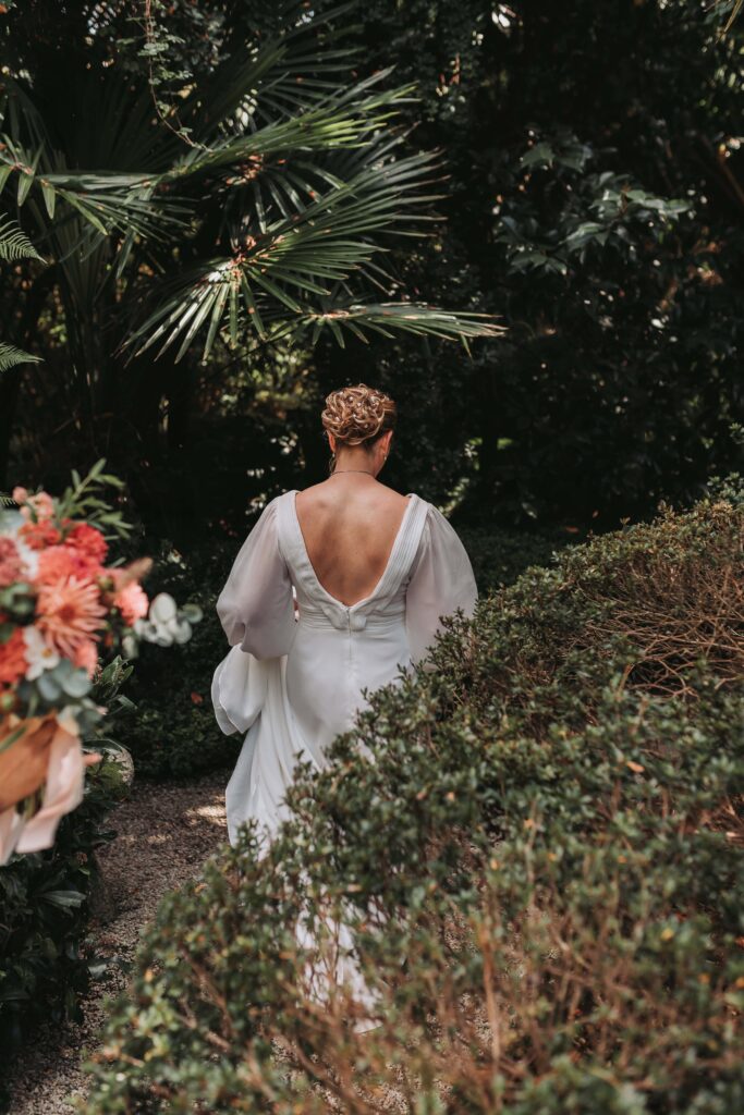 brides walking through lamorran gardens
