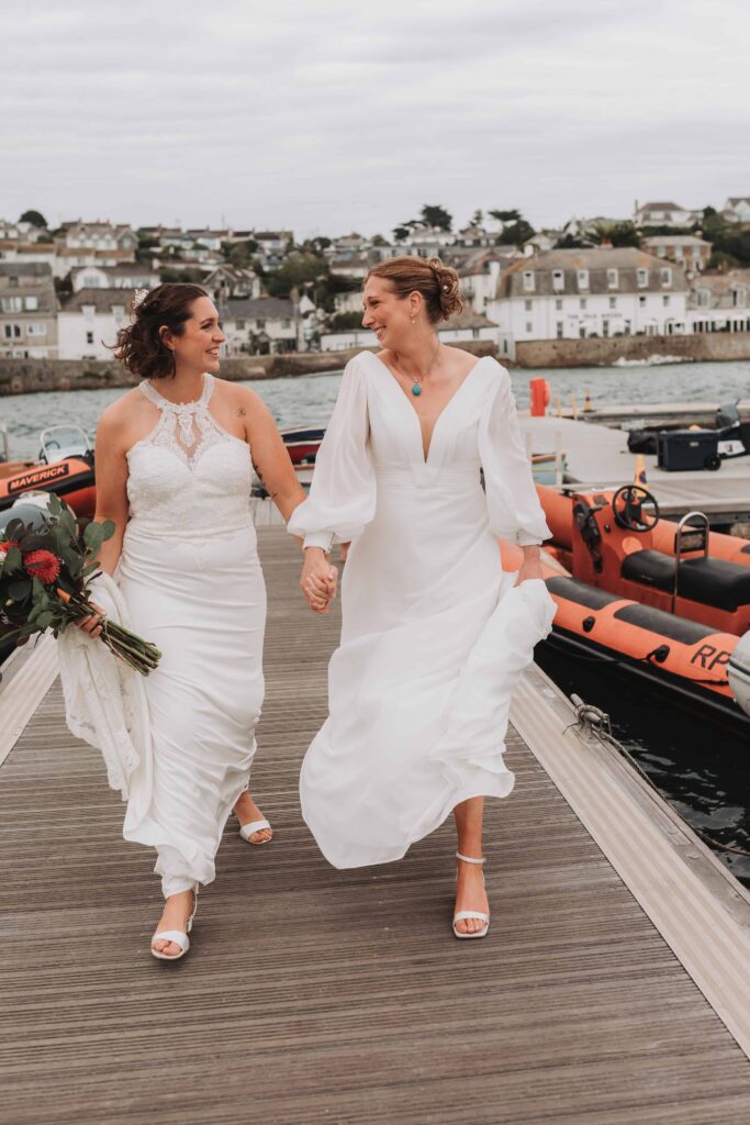 brides walking down gangway in st mawes