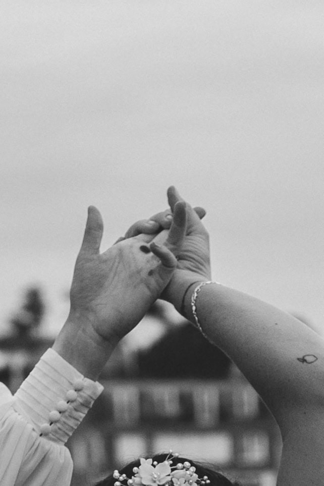 close up of brides hands twirling