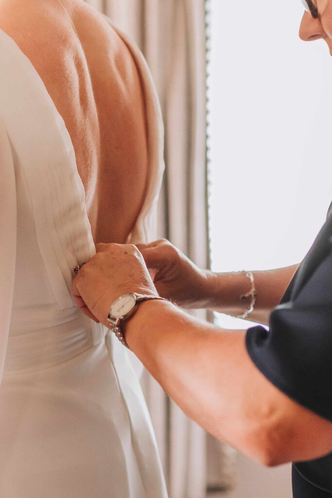 mum doing brides dress up at cornwall lgbtq+ wedding