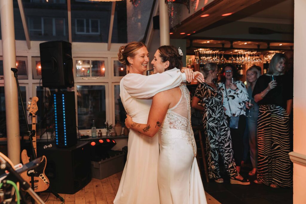 two brides dancing their first dance