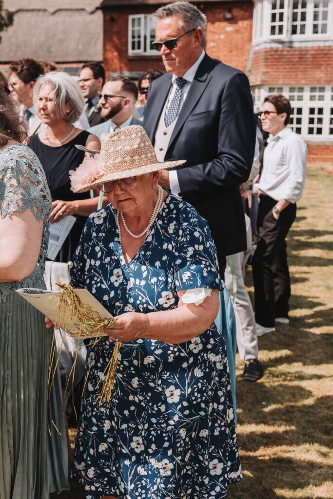 grandman singing along during the ceremony