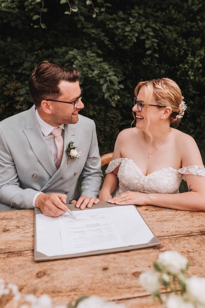 signing the register at treseren wedding