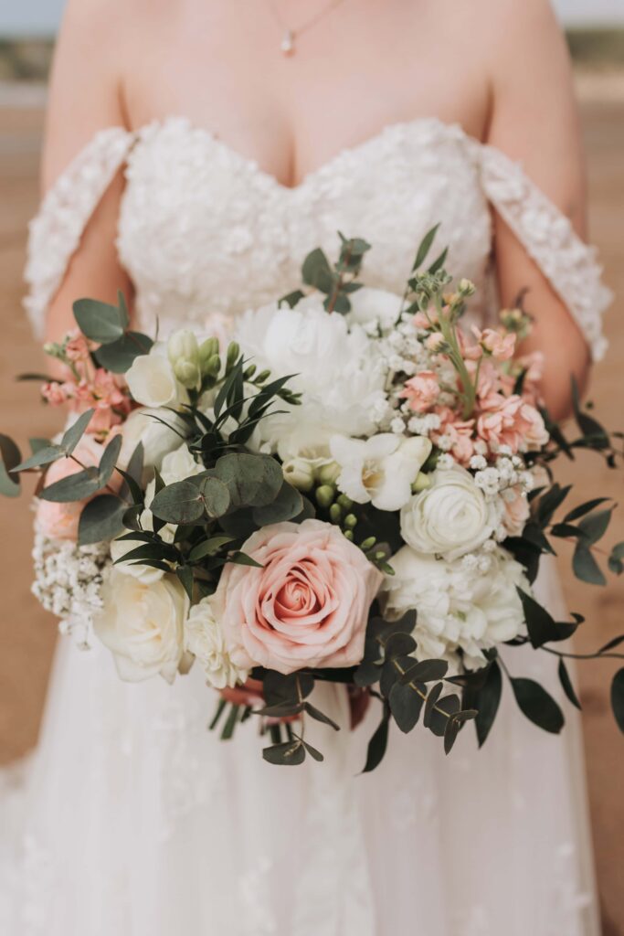 bride holding her bouquet at cornish wedding