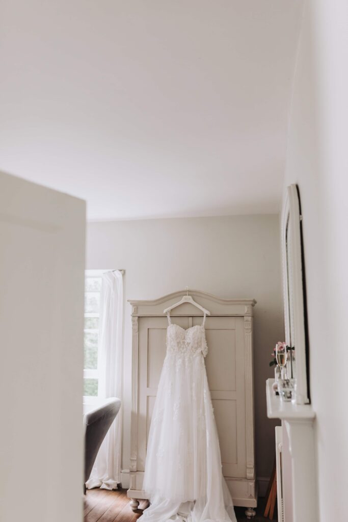 wedding dress hung up at treseren