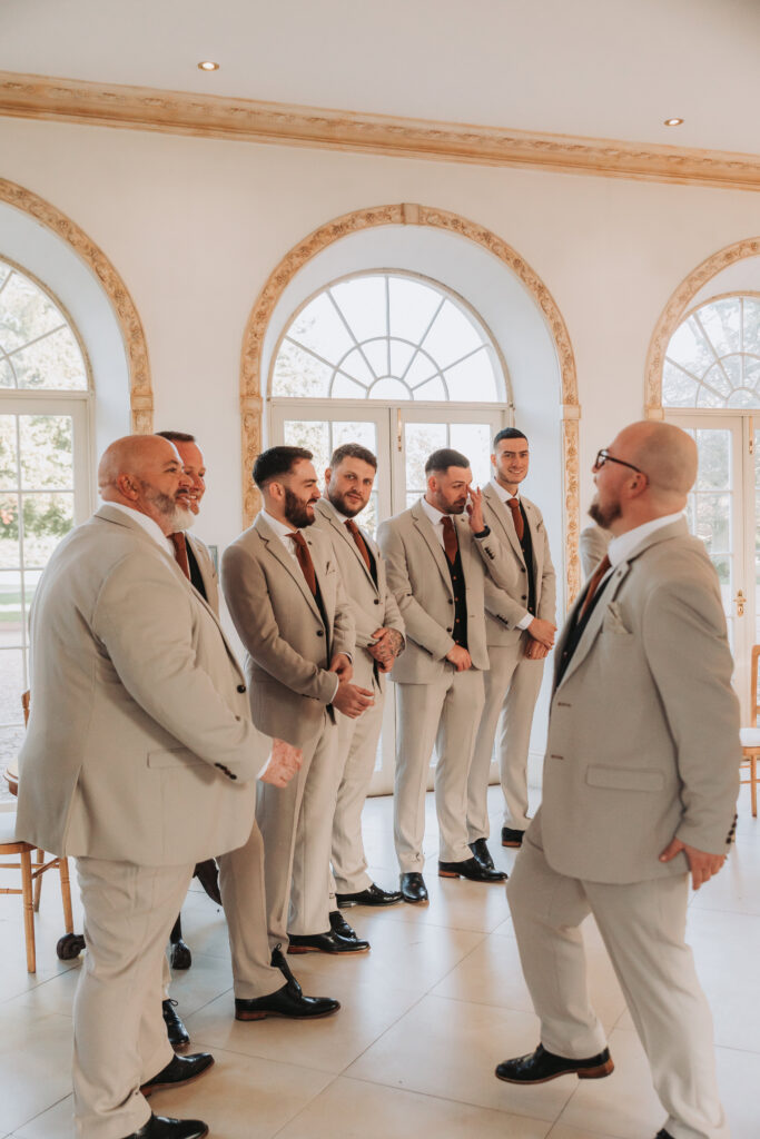 groomsman at the front of the ceremony at northbrook park wedding
