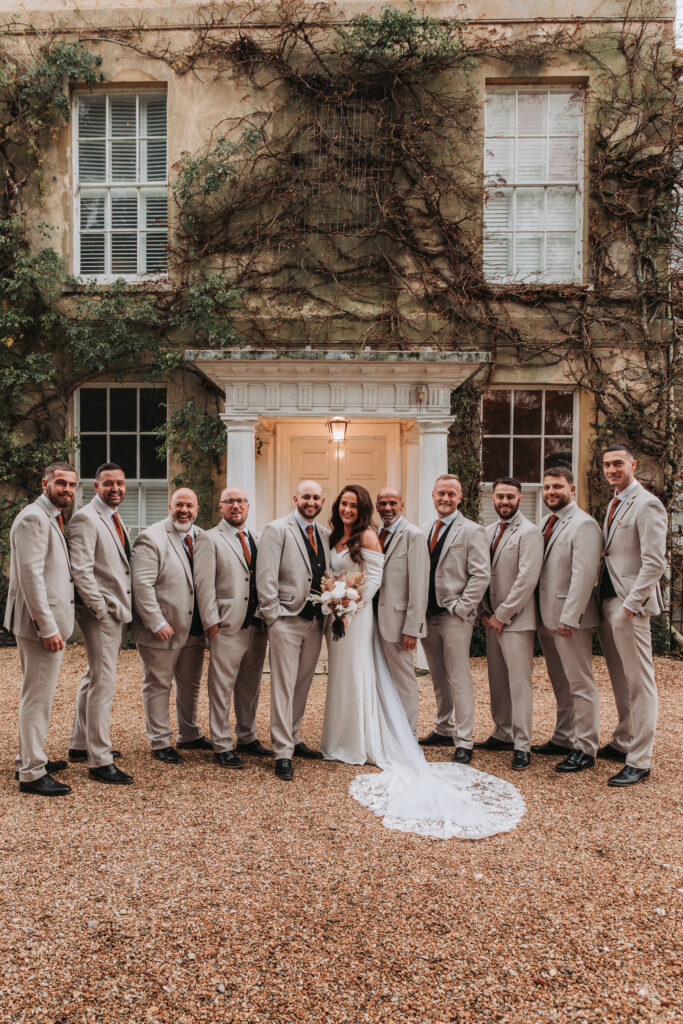 groomsman having a photo outside northbrook park