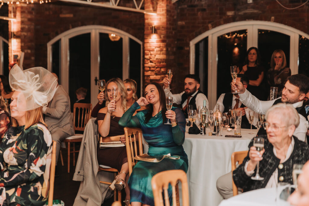 guests listening to speeches at northbrook park wedding