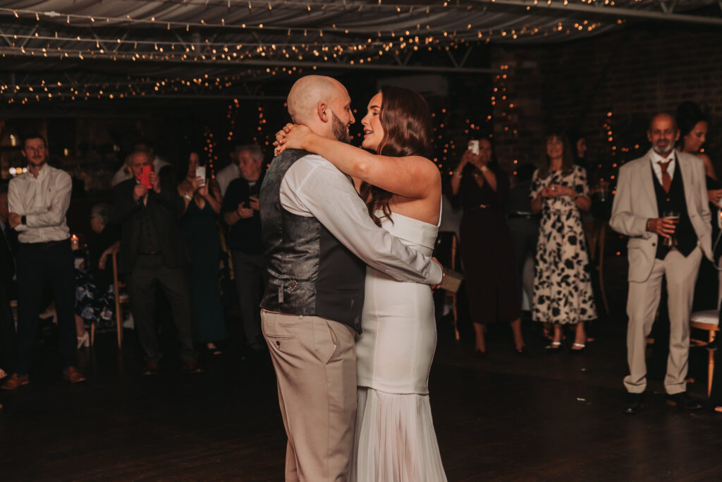 bride and groom having first dance at northbrook park wedding