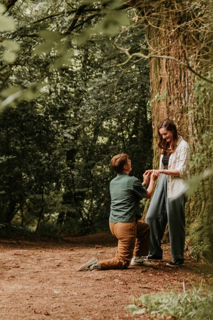 person down on one knee for surprise proposal