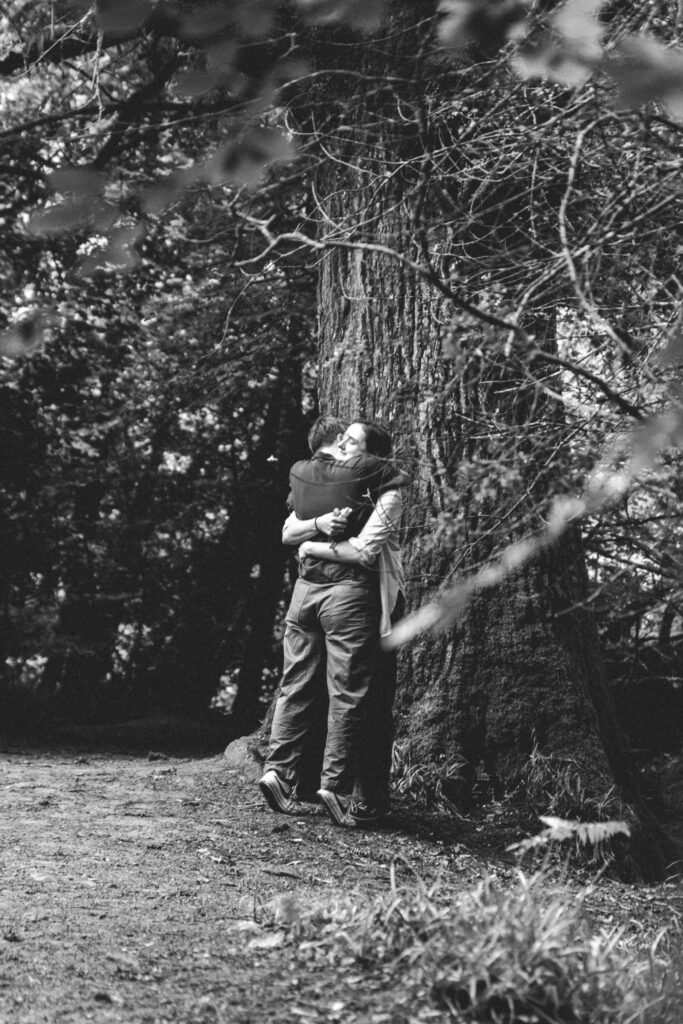 couple hugging after surprise proposal